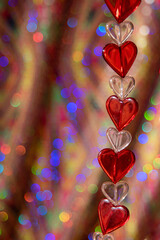 valentine background with hearts and sparkly bokeh