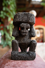 statue of Maya worker