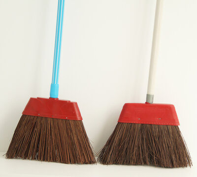 Piassava,  pia&ccedil;ava  broom  with long wooden handle isolated on white background, S&atilde;o Paulo, Brazil