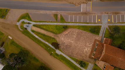 Church seen from the sky with drone, street intersection.