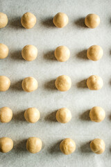 Fototapeta na wymiar peanut butter dough balls on a baking tray