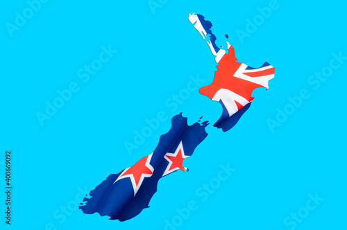 Happy Waitangi or New Zealand Day on February 6 concept with contour of the map and the flag isolated o blue background with clipping path cutout