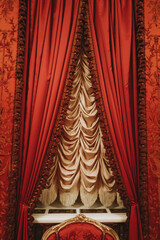 Red curtains with fringe and gold fabric
