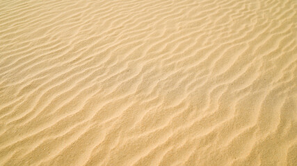 sand ripples in the desert, sand background, travel and vacation concept