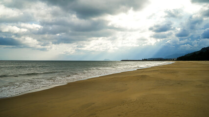 clouds over the sea on the wild beach, freedom travel concept, cloudy weather over the beach and sea on the island
