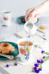 cup of tea with cookies