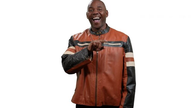 African American man points to center of screen then makes larger and larger circles with his hand on white background