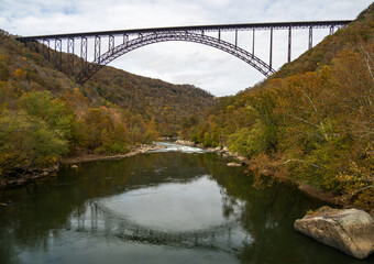 Vista of the river, mountains, and New River Gorge Bridge in the national park in West Virginia.