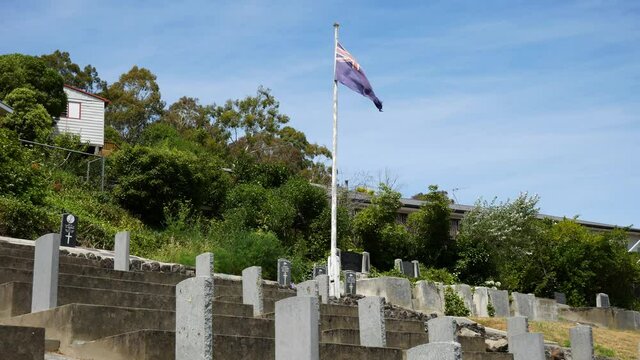 New Zealand Flag blowing in Wind, Lyttelton, New Zealand