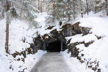 Ruskeala, Russia - January 15, 2021: Entrance to the cave in Ruskeala mountain park