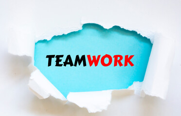 TEAMWORK text on white envelope and torn paper. Concept Image