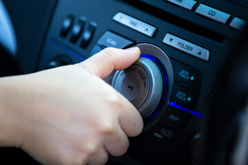 hand holding a radio car