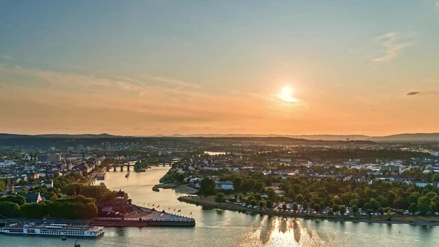 Time-lapse of Deutsches Eck at Koblenz, Germany, city and river at dusk
