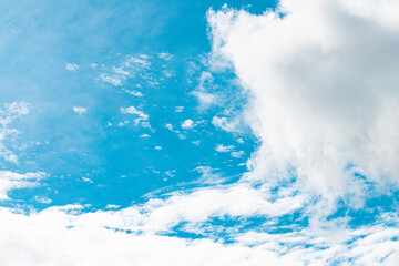 Blue sky with fluffy white clouds