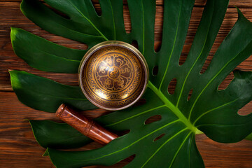 Tibetan singing bowl. Tibetian inscription - mantra 