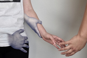 close up of a person holding hands