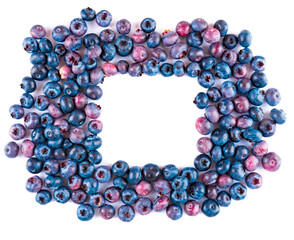 Fresh blueberries and leaves, berry frame isolated on white background, top view, frame