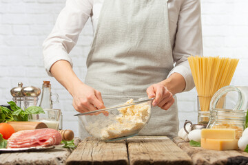 The chef prepares making baking dough, italian pasta or focache or bread.
