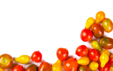 various colorful tomatoes isolated on white background