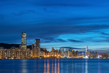 Panorama of Victoria harbor of Hong Kong city at dusk