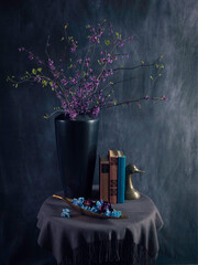 Still Life With Flowers And Books