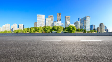 Asphalt road and modern city commercial buildings in Beijing,China.
