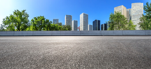 Asphalt road and modern city commercial buildings in Beijing,China.