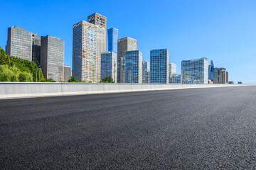 Asphalt road and modern city commercial buildings in Beijing,China.