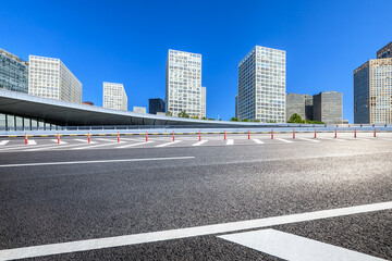 Asphalt road and modern city commercial buildings in Beijing,China.