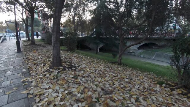 walk through Bajram Curri Boulevard beside the Lana River in Tirana, Albania - Wide push in Gimbal shot