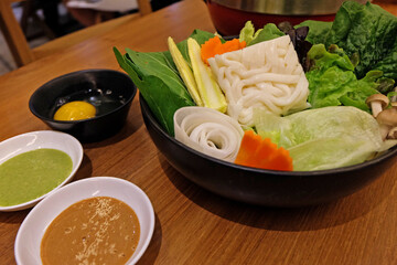 Vegetables, Udon noodle and dipping sauce prapared for Shabu Shabu (Japanese hot pot)