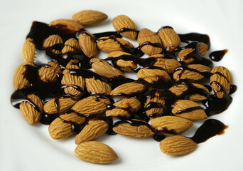 nuts, almonds with chocolate topping