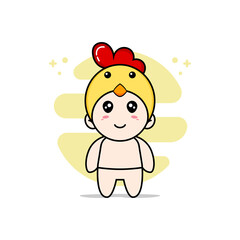 Cute baby character wearing chicken costume.