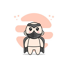 Cute baby character wearing superhero costume.