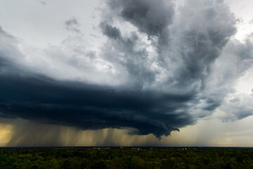 Fototapeta na wymiar Storm clouds with the rain. Nature Environment Dark huge cloud sky black stormy cloud .