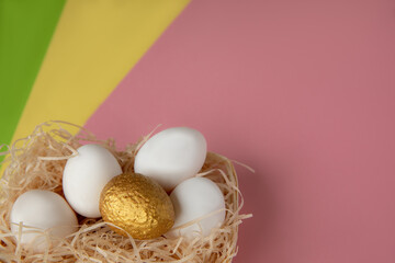 Preparing for Easter. Decorating - painting eggs. Easter eggs in a basket. Preparing for Easter. Coloring. Decorating. net for eggs on a colorful background.
