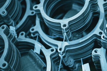 Metal gaskets for pipelines. Abstract industrial background toned in blue