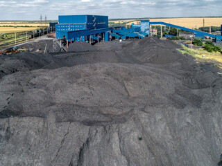 Dump of coal. A high pile, aerial view.