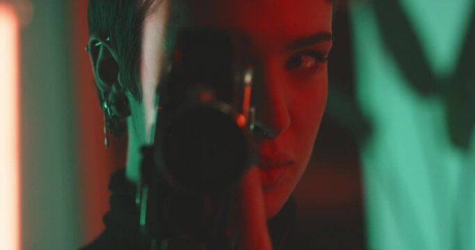 A young caucasian woman filming with a vintage camera