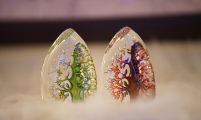 Transparent crystal figurine with colorful patterns