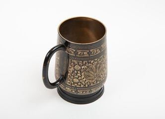 Bronze mug with oriental pattern