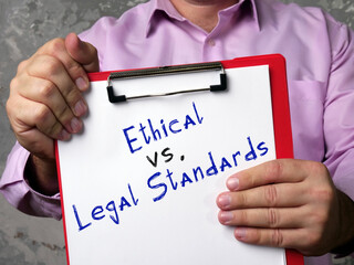  Financial concept about Ethical vs. Legal Standards with phrase on the page.
