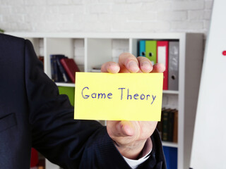 Juridical concept meaning  Game Theory    with phrase on the piece of paper.