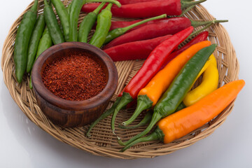 Fresh hot peppers in various color isolated.