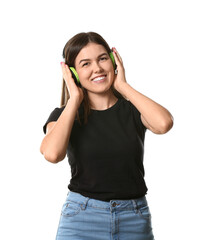 Naklejka premium Beautiful young woman with headphones on white background