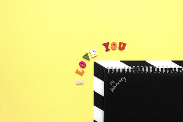 word love, notepad with chalk drawn heart. Valentine's day concept