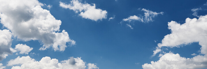 Blue sky background with clouds in summer day. Panorana view