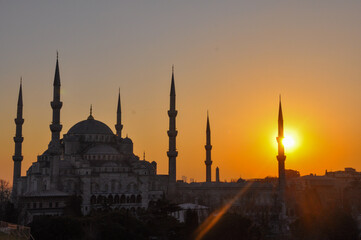 Fototapeta na wymiar Islamic place of worship, mosque structure. Istanbul Hagia Sophia Mosque in Turkey. Mosque silhouette and sunset.