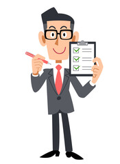 チェックリストを持つメガネをかけたビジネスマン
