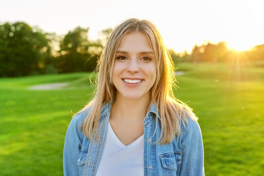 Portrait of smiling beautiful happy young woman 20 years old